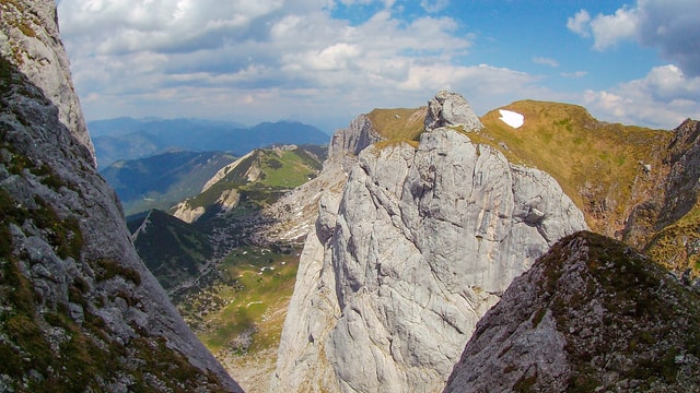 The beginning of Seekarlspitze via ferrata and the view on almost the same cliff on the opposite side