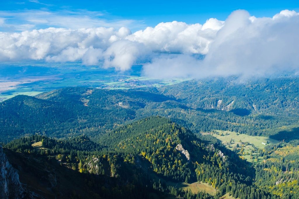 Forest laying below Benediktenwand as clouds are closing by