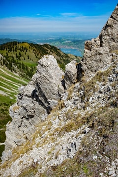 Schliersee viewed through the rocks on the way to the summit of Brecherspitz