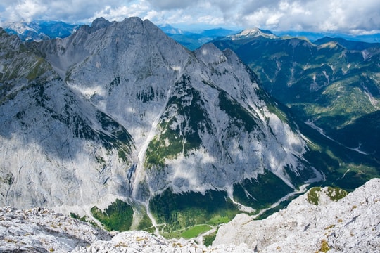 The east side of Laiderer Falk mountain with the green valley below